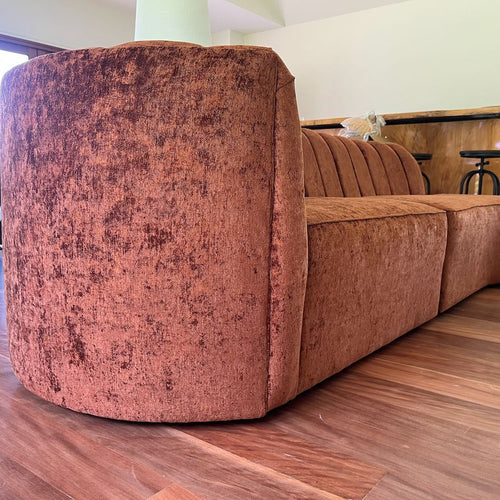 arm of curved lounge