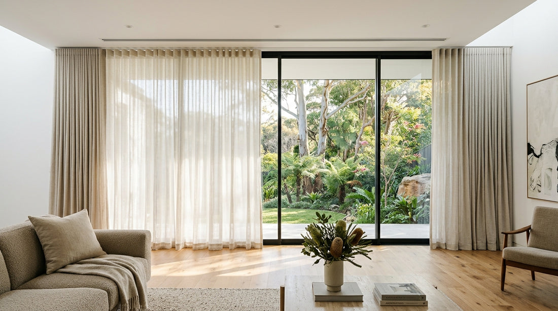Custom S-Wave sheer linen curtains and layered blockout drapery on a recessed ceiling track in a Sydney living room by Leisure Lounges